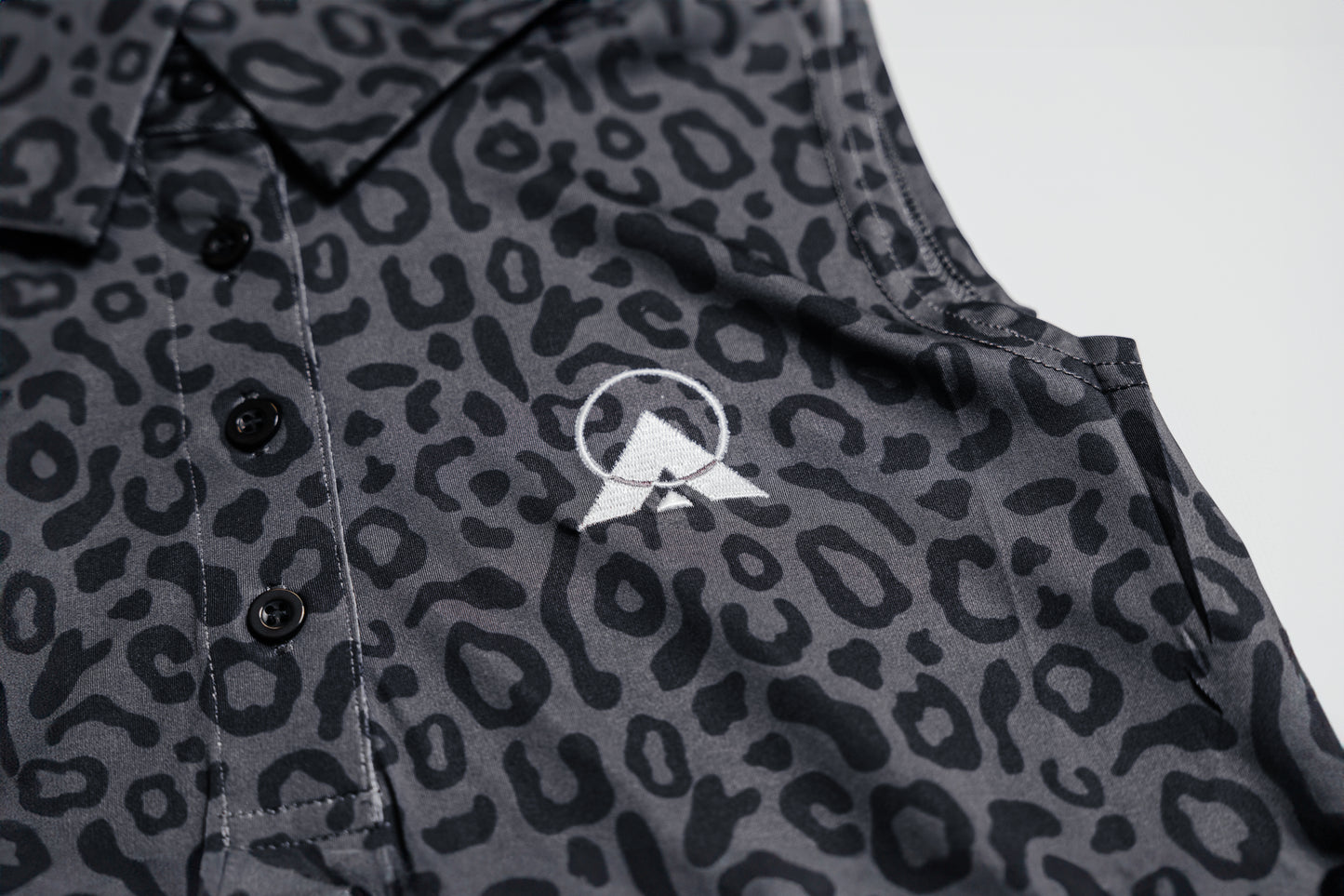 (WOMENS) CHEETAH NOIR POLO